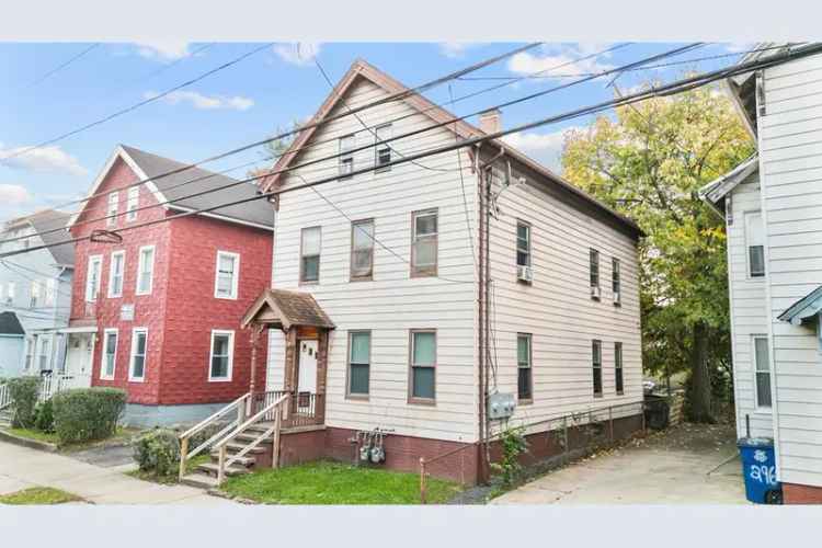 Buy Duplex in New Haven with Two Units and Spacious Backyard