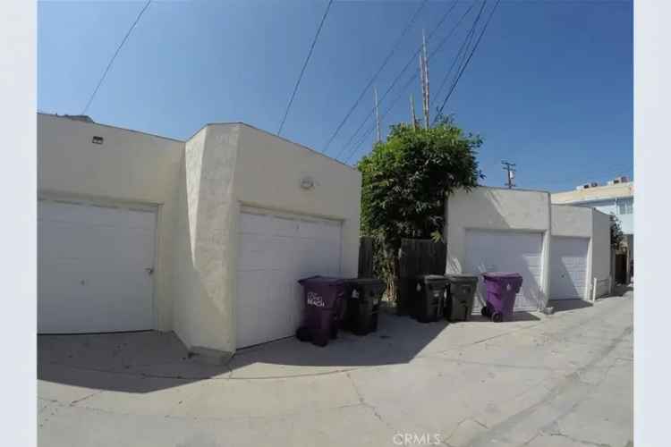 Buy duplex in Belmont Shore with prime location and garages