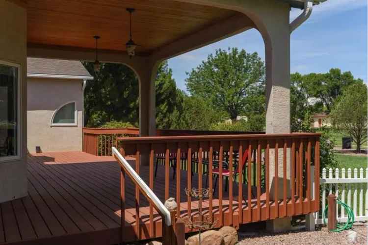 Buy Home in Pueblo West with Golf Course Views and Impressive Features