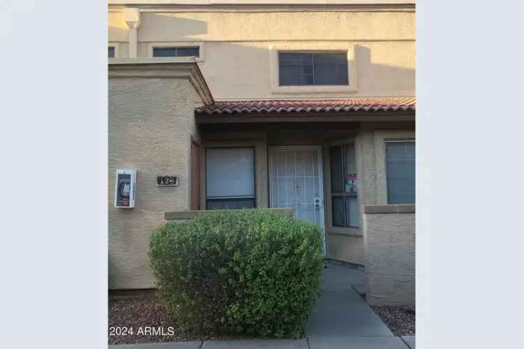 Buy Townhome in Quiet Neighborhood with Pool and Spa Features