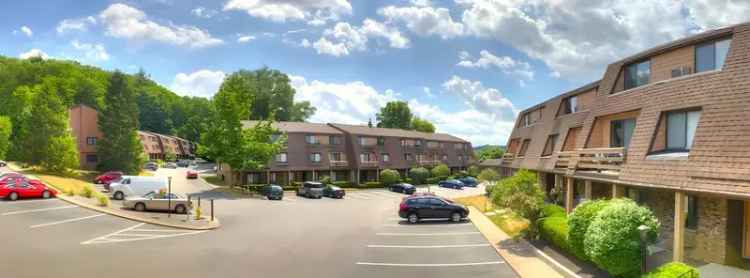 Rent Apartments in Monroe County with Private Balconies and Wooded Views