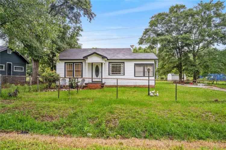 Buy Cottage in Eight Mile with Spacious Yard and Sunroom