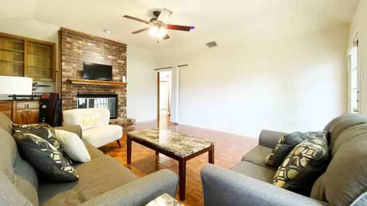 Rent Charming Residence with 3 Bedrooms and Modern Kitchen in Garland