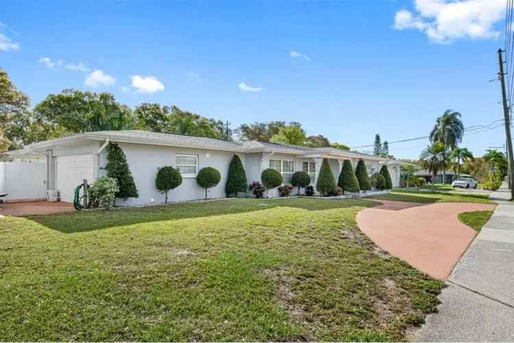 Buy Charming Corner Lot Home in Pinellas County with Elegant Bathrooms