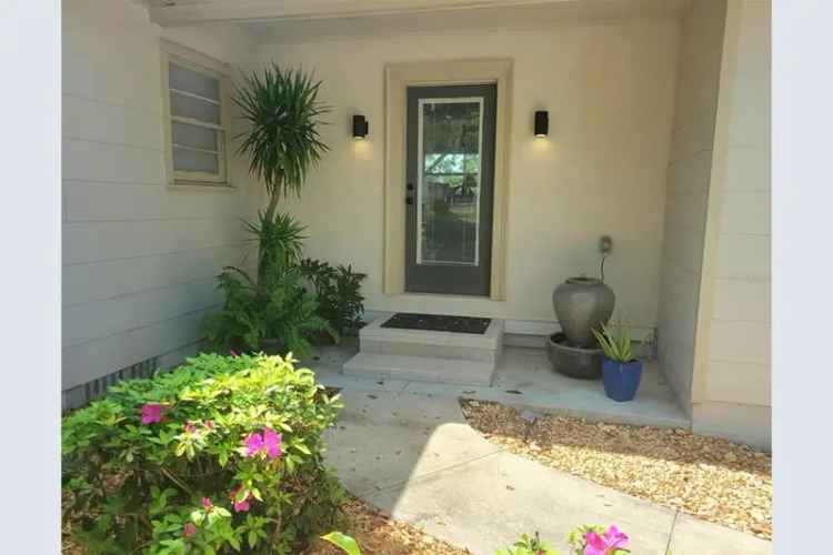 Buy Waterfront Retreat with 3 Bedrooms and Private Dock in Clearwater