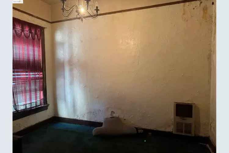 Buy Victorian Fixer Upper in West Oakland with Spacious Backyard