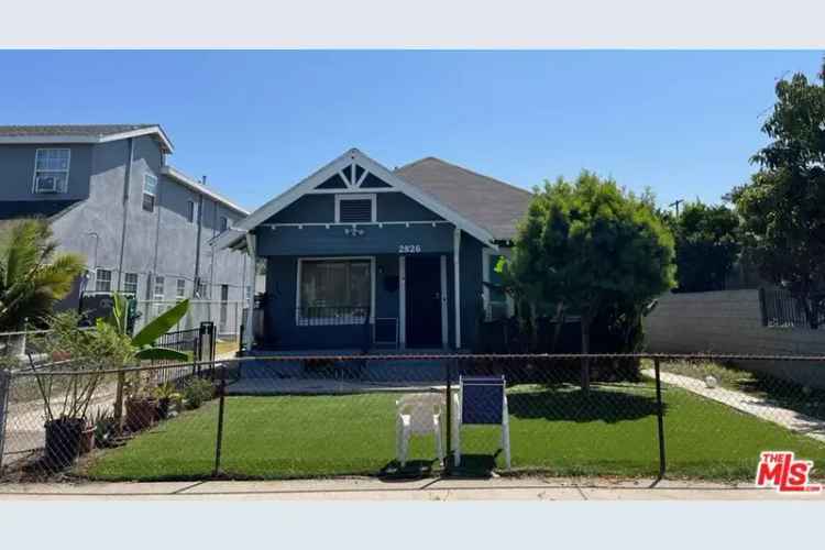 Invest in a 4 Bed 2 Bath Property with Attached Unit in West Adams