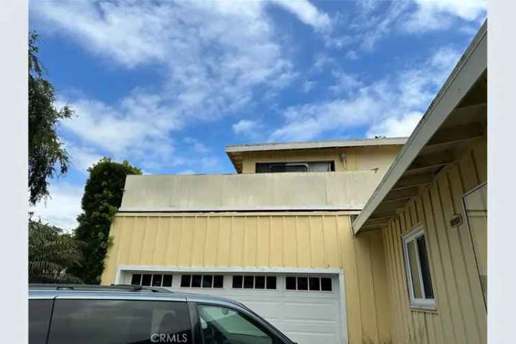 Potential Buy House in Long Beach with Spacious Layout and Solar Features