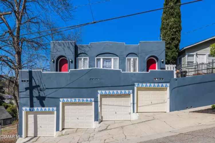 Duplex for Sale in Highland Park with Updated Units and Garages