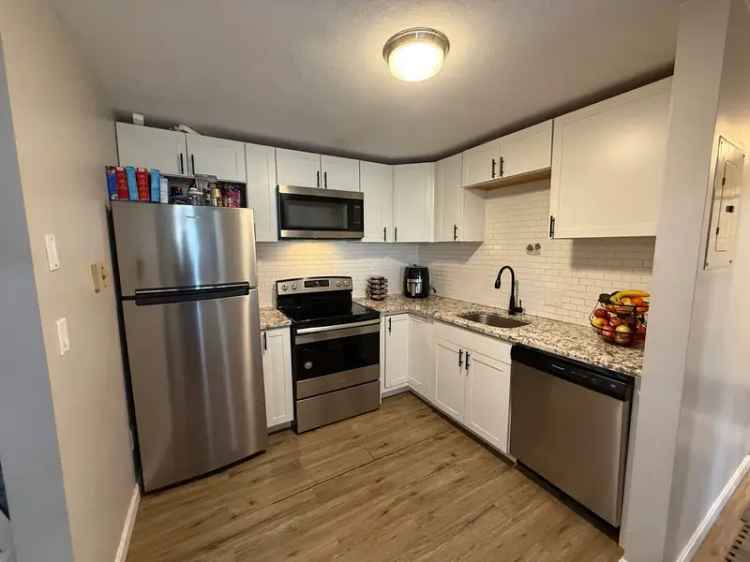 Rent Apartment Unit with Renovated Kitchen and Parking