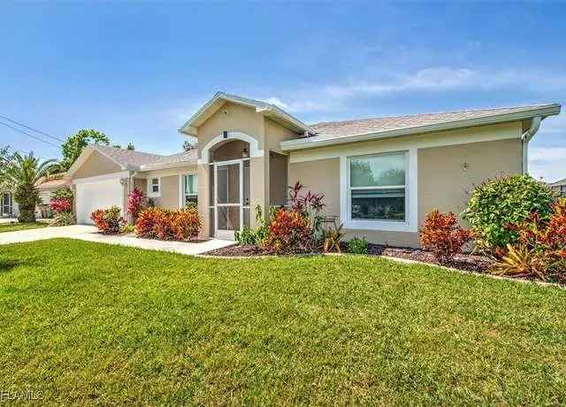 Buy Fresh Water Canal Home in a Family-Friendly Location with Garden Views