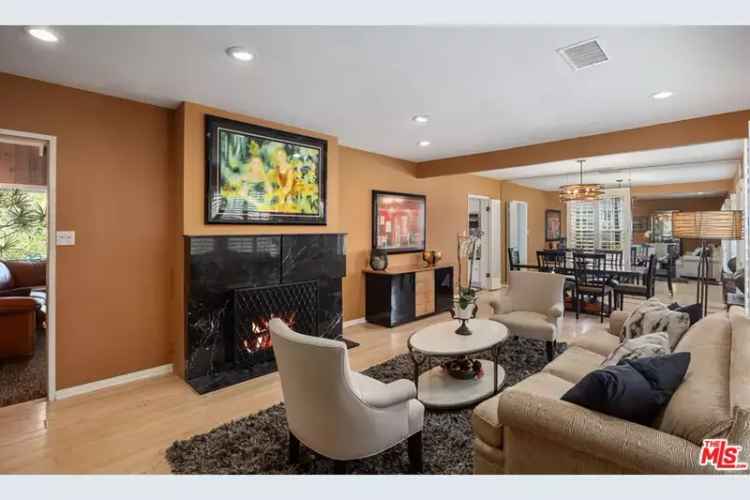 Buy Cheviot Hills Home Featuring 3 Bedrooms, Pool, and Lush Landscaping