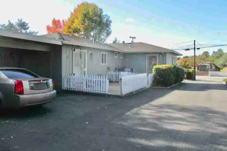 Rent Fourplex in Ideal Location with Enclosed Yards and Carports