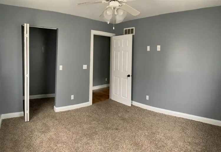 Rent this fully remodeled two bedroom tri-plex unit with private parking