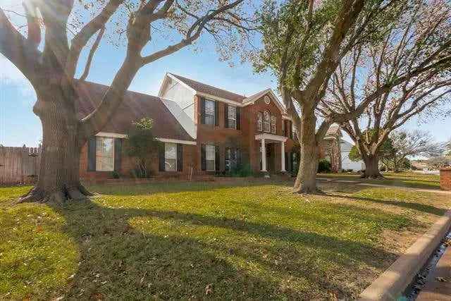 Buy Stunning Brick Residence in Fairway Oaks with Mature Trees and Spacious Layout