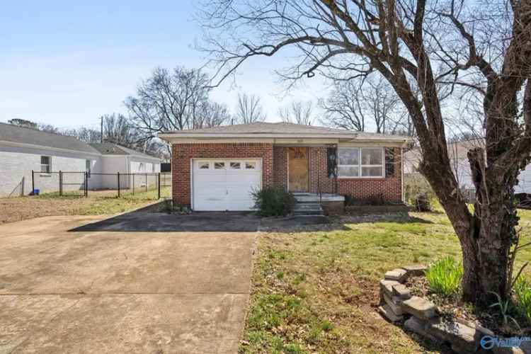 Invest in a Full Brick Home in Huntsville Five Points with Spacious Backyard