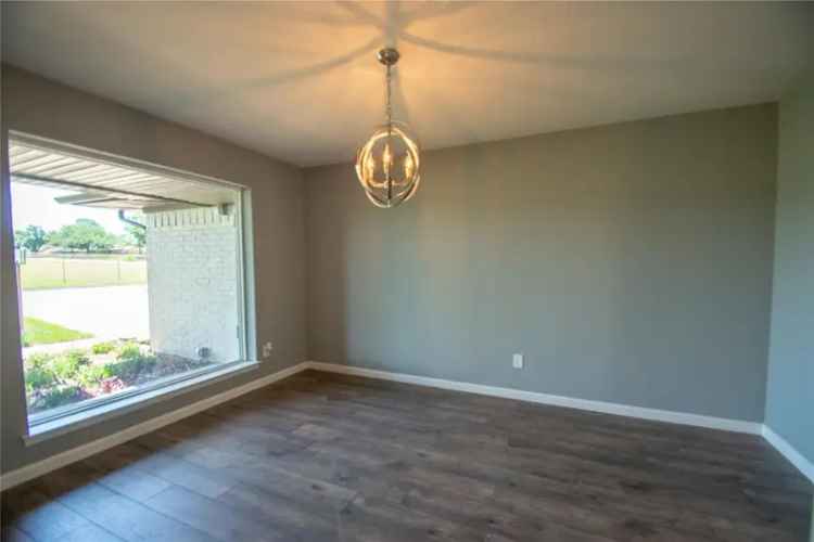 Renovated buy house in charming neighborhood with spacious features