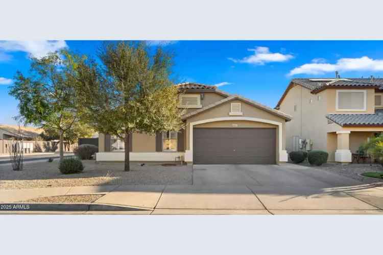 Buy Home in Canyon Trails with Spacious Family Room and Lush Backyard