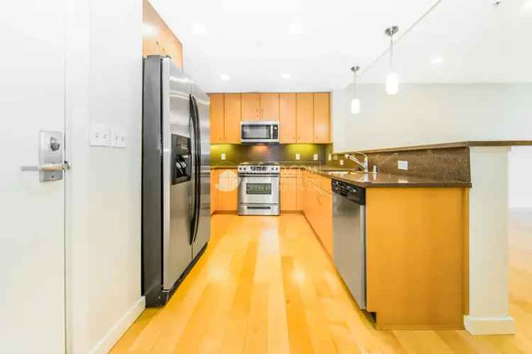 Rent Condo in Downtown Oakland with Chef's Kitchen and Rooftop Deck