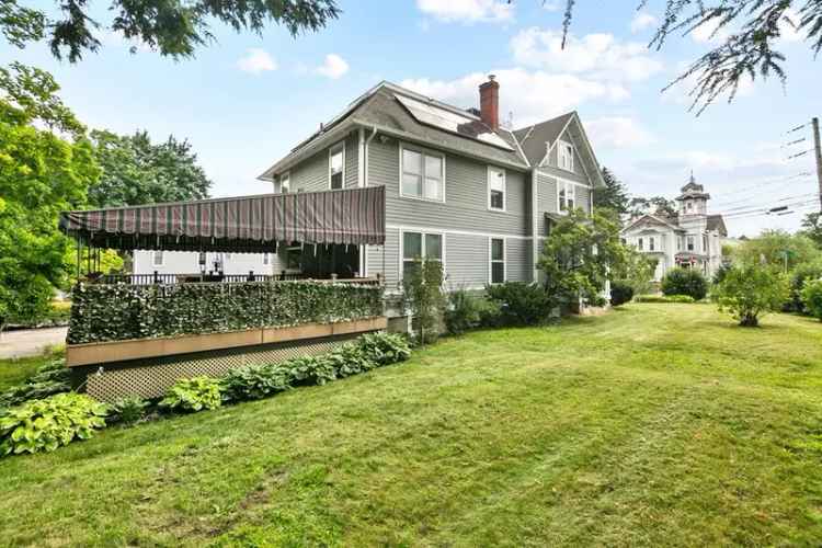 Historic Victorian home for sale in Torrington with modern kitchen and charm