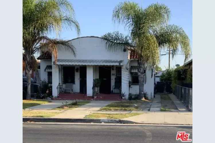 Investment Opportunity Duplex in Vibrant Community with Renovation Potential