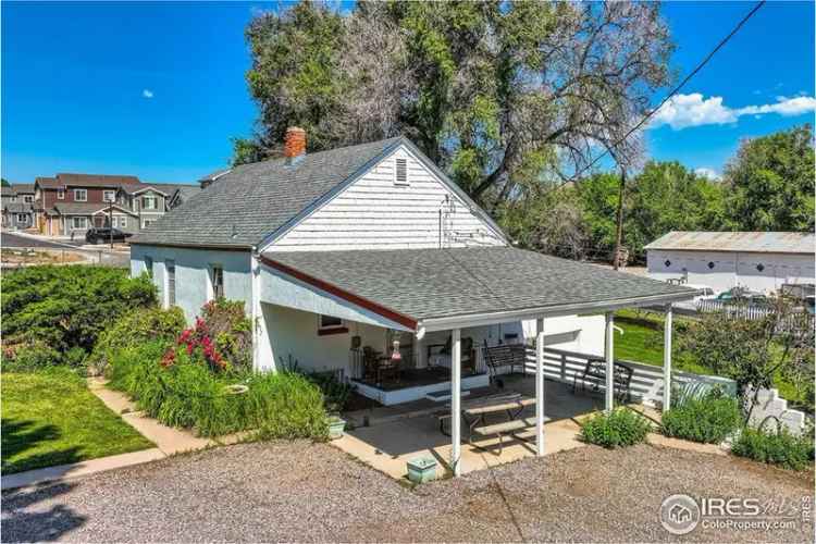 Buy Development Land in Longmont with Farmhouse and Water Rights