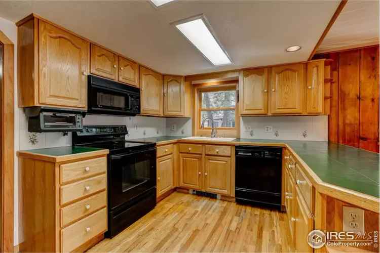 Buy two houses in Estes Park with main home and charming cabin