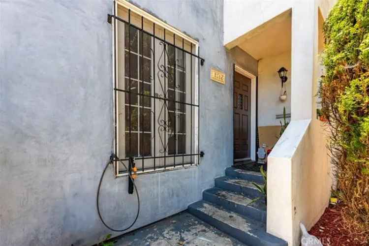 Multi Family Buy in Los Angeles with Spacious Living and Private Patio