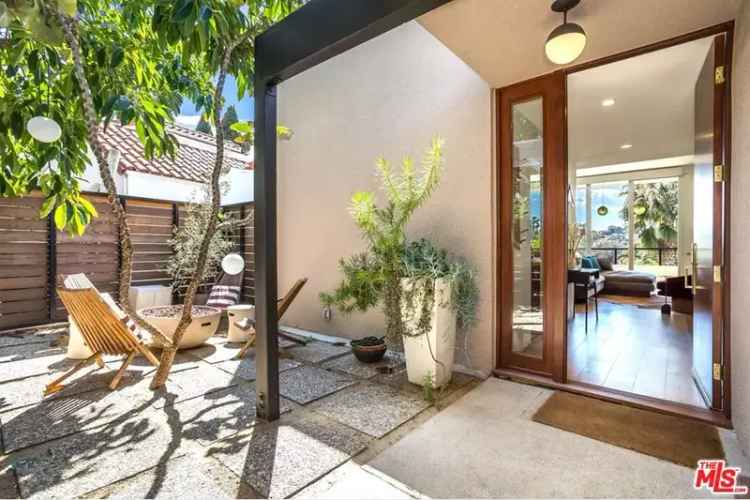 Rent mid-century modern duplex in Whitley Heights with city views