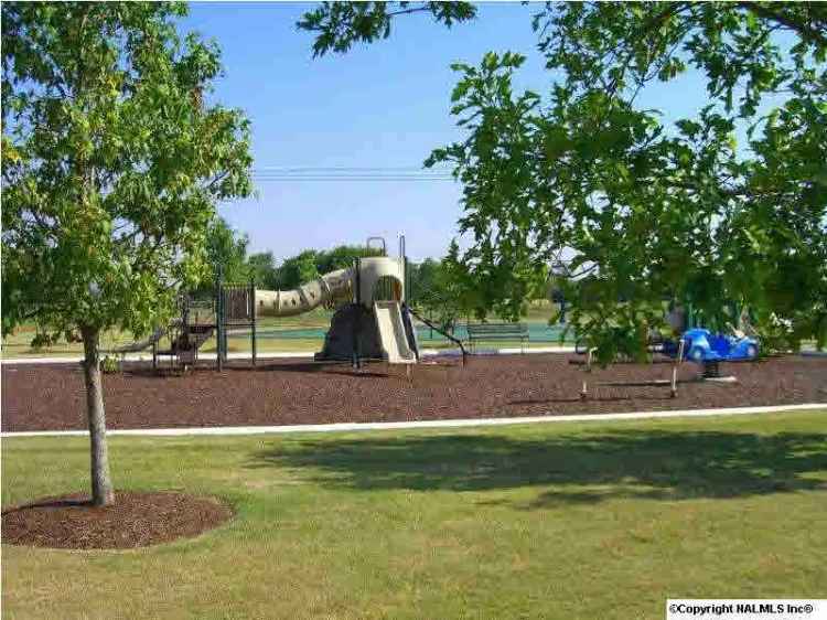 Buy Land in Planned Community with Pool and Clubhouse Features