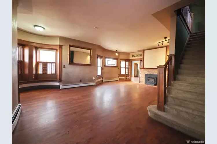 Buy historic home in Denver with unique turret room and updated kitchen