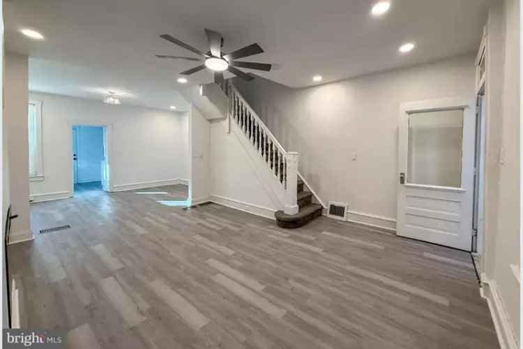 Buy Townhome in Wilmington with Sunroom, Modern Kitchen, and Backyard