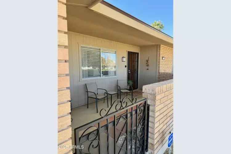 Buy Home with Sunroom and Greenbelt Views in Your Happy Place