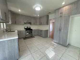 Rent Updated Single Family Home in Van Nuys with Spacious Backyard