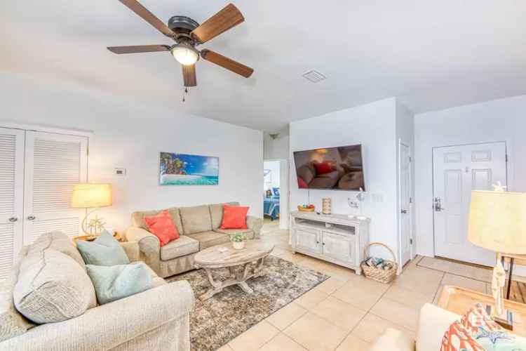 Buy Charming Unit in Orange Beach with Pool and Pond Views