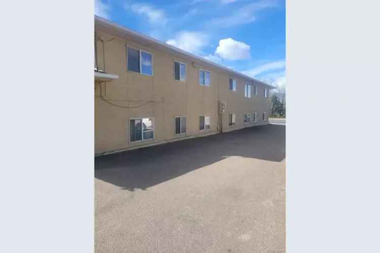 For Sale Quadplex with Three and Two Bedroom Units in Prime Location