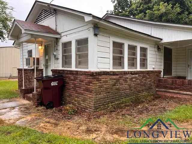 Fixer Upper Buy Home Near Main St with 3 Bedrooms and 2 Living Areas