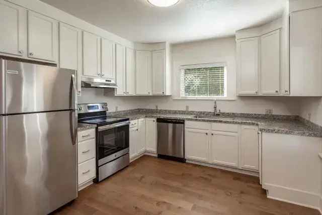 Rent Apartment Unit with Two Bedrooms and Backyard in Convenient Location