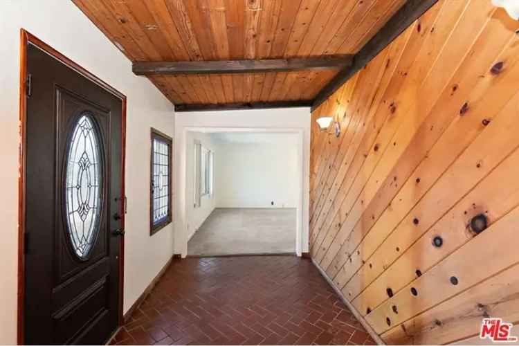 Buy Tudor house in West L.A. with 2 bedrooms and bonus room