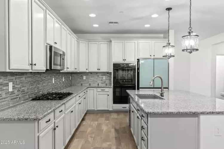 Buy 4 Bedroom Home in Verrado with Pool and Gourmet Kitchen