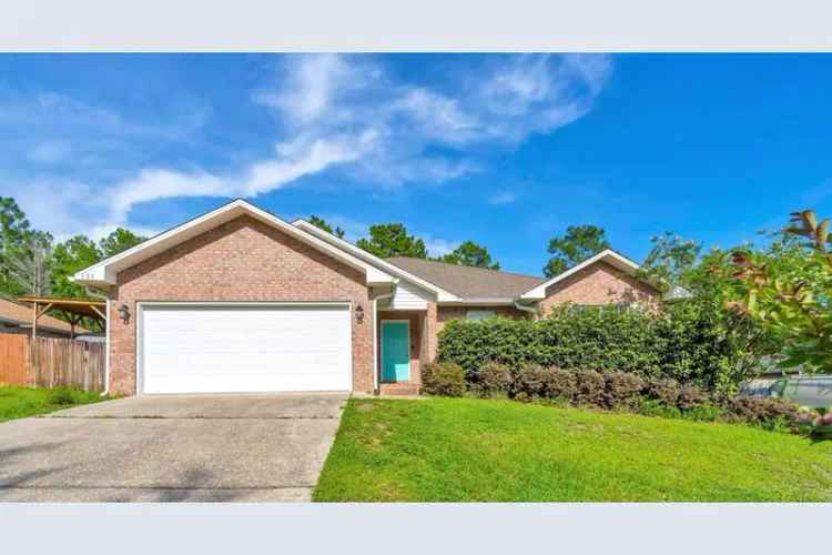 Buy charming brick home in Crestview with spacious backyard and garage