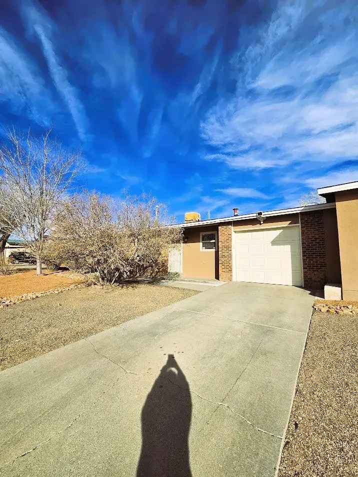 Buy Updated Home in NE Albuquerque with 3 Bedrooms and Cozy Backyard