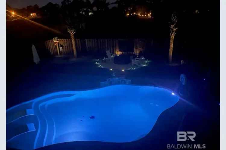 Buy House in Orange Beach with Pool and Workshop Features