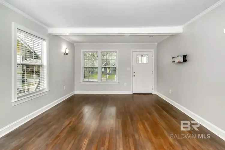 Buy Cottage in Midtown with Updated Features and Cozy Charm