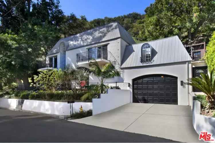 Buy modern French Normandy style home in Beverly Hills with guesthouse