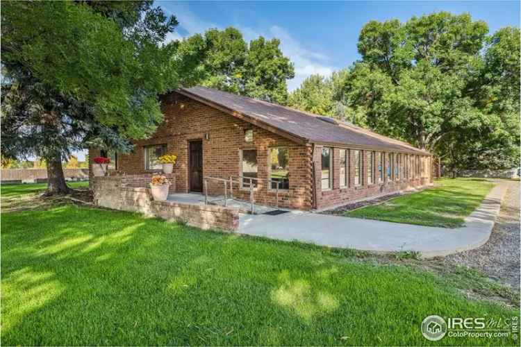 Buy Charming Home with Spacious Lot and Greenhouse in Longmont