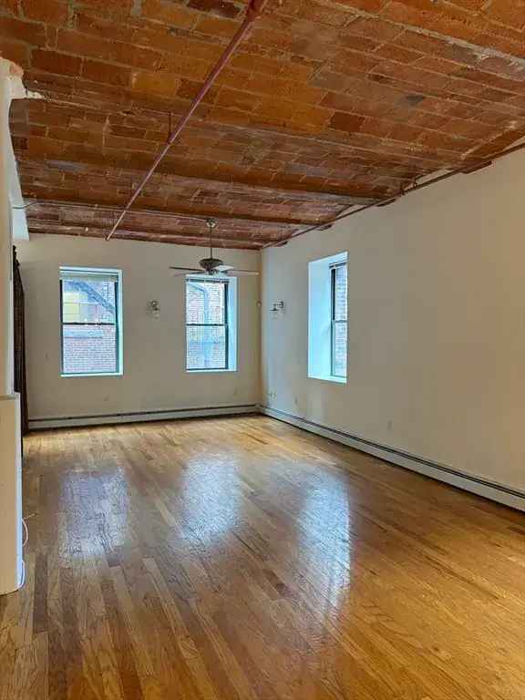 Modern Loft for Rent in Boston's Historic Leather District with Unique Features