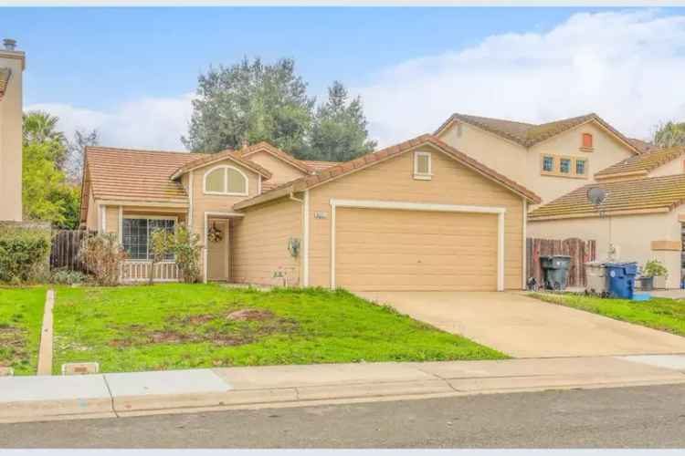 Buy Charming Home in Elk Grove with Cozy Porch and Inviting Yard