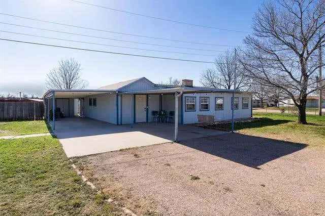 Buy Spacious Lakefront Home with Sunroom in Peaceful Retreat