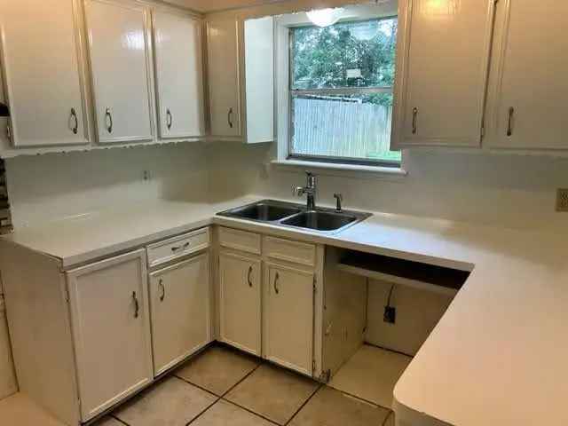 Buy House in Angleton with Three Bedrooms, Large Family Room and Garage